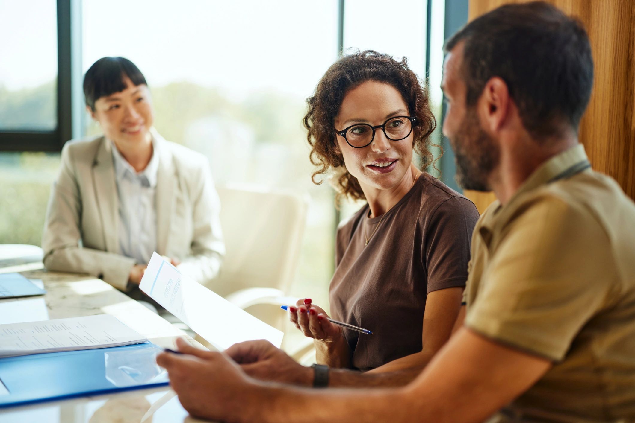 Clients meeting with a financial professional in an office